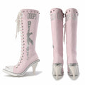 Pink high-heeled boots with 'COOPS' branding on a white background