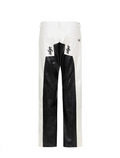 Black and white pants with unique design on a white background